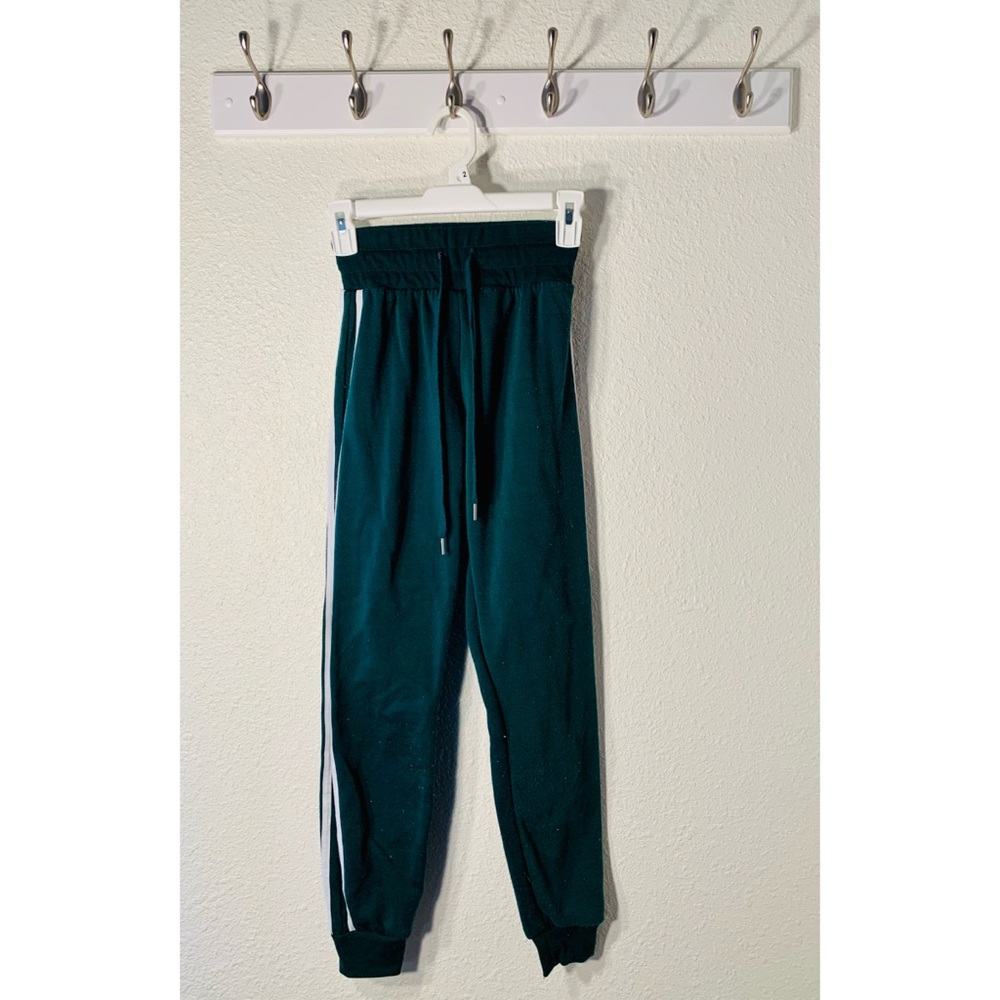 Green lounge pants with side stripe